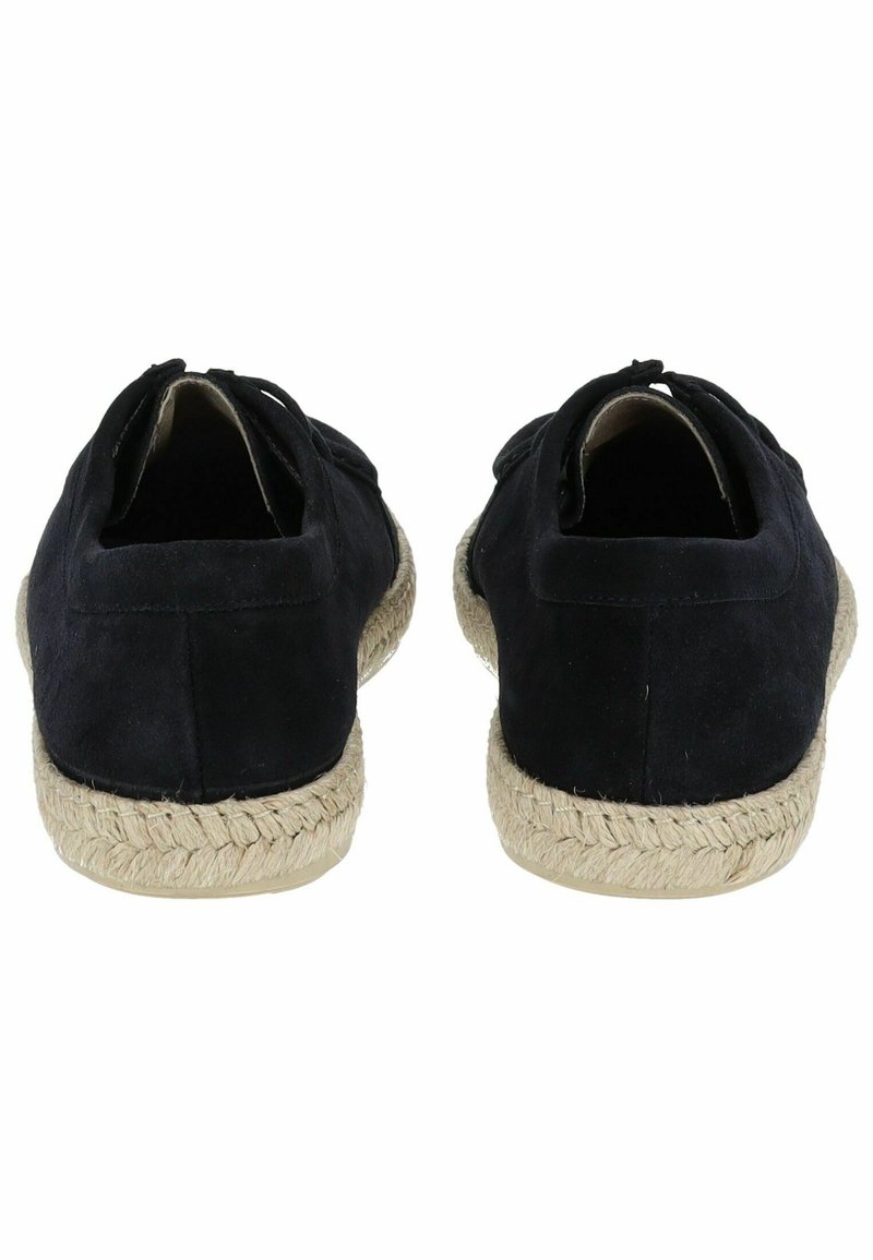 Espadrillas in suede nero con suola avvolta in juta, dettaglio posteriore con una piccola apertura e accenti di cucitura. Design casual slip-on.