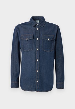 Donkerblauwe denim blouse met een klassieke kraag, lange mouwen en twee borstzakken. Voorzien van witte knopen en contrasterende stiksels.