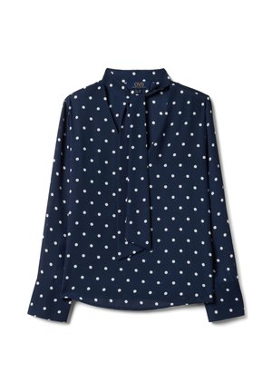 Blusa de manga larga azul marino con lunares blancos y detalle de pañuelo anudado en el cuello, extendida sobre un fondo blanco.