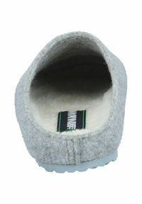 Gray wool slipper with a soft interior lining, rounded shape, and lightweight outsole. Features a black and green label inside.
