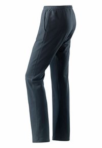 Ciemnoszare spodnie sportowe wykonane z miękkiego materiału. Posiadają elastyczny pas i boczne kieszenie. Prosty krój z subtelnymi detalami szwów.