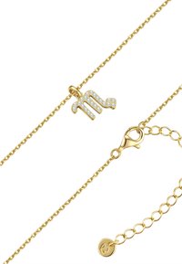 Zlatna narukvica s privjeskom simbola Škorpiona ukrašenim prozirnim kristalima. Uključuje kopču na kuku i produžnu lančić.