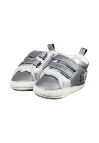 Silver and white baby shoes with two velcro straps, fluffy lining, and heart-shaped patch on the side.