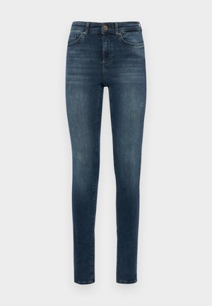 Mørkeblå, slim-fit jeans laget av denim; har en standard knappelukking og fem-lomme-design; glatt tekstur med minimal falming.