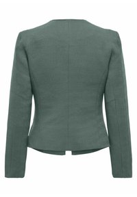 Blazer vert texturé avec une coupe ajustée, manches longues et col cranté. Présente un motif chevrons et une fente au dos pour plus de confort.