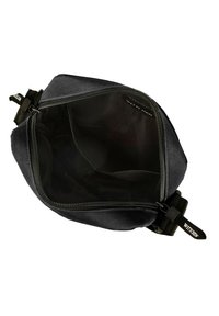Fodero da viaggio nero realizzato in tessuto resistente con chiusura a zip. L'interno è liscio e non colorato, dotato di una tracolla per una facile maneggevolezza.