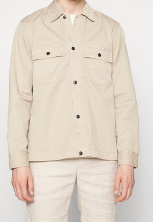 Chaqueta fina - beige