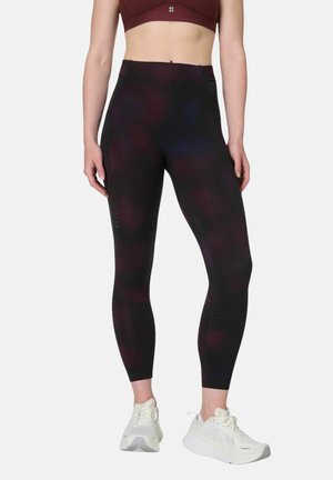 Zwarte leggings met een hoge taille en een verloopmotief in donkerpaars en blauw, gemaakt van rekbare stof, met een strak, aansluitend ontwerp.