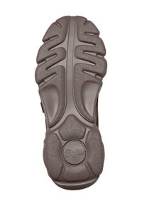 Sole in gomma marrone con superficie testurizzata, caratterizzata da profonde scanalature e motivi circolari, con il marchio "Buffalo" al centro.