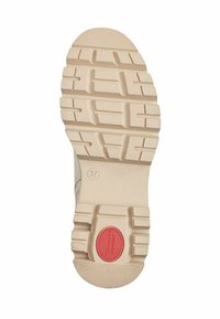 Suola della scarpa in gomma beige chiaro con modelli di grip testurizzati. Presenta un accento circolare rosso e la marcatura della taglia (37) incorporata nella suola.