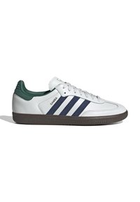 White leather sneaker with dark green accents, three navy stripes, lace closure, rubber sole, and textured finish. Model name "Samba."