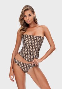 Jednoczęściowy strój kąpielowy bez ramiączek w odcieniu nude z czarnymi wzorami w spirale; pasujące bikini; gładka tekstura, dopasowany krój.