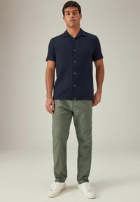 Next SLIM FIT zielony