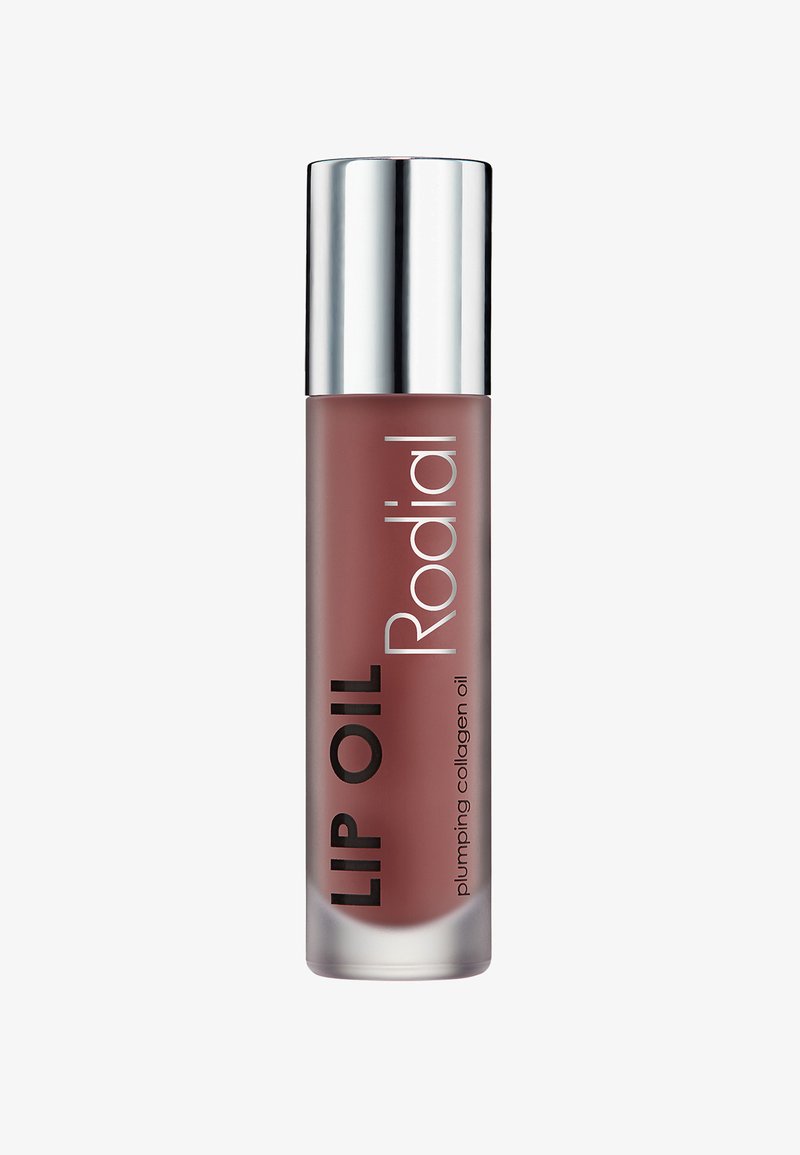 Lippenöl in einer frosted Glasflasche mit mattem Braun-Finish, einem silbernen Deckel und auffälligem schwarzen Text "LIPPENÖL Rodial".