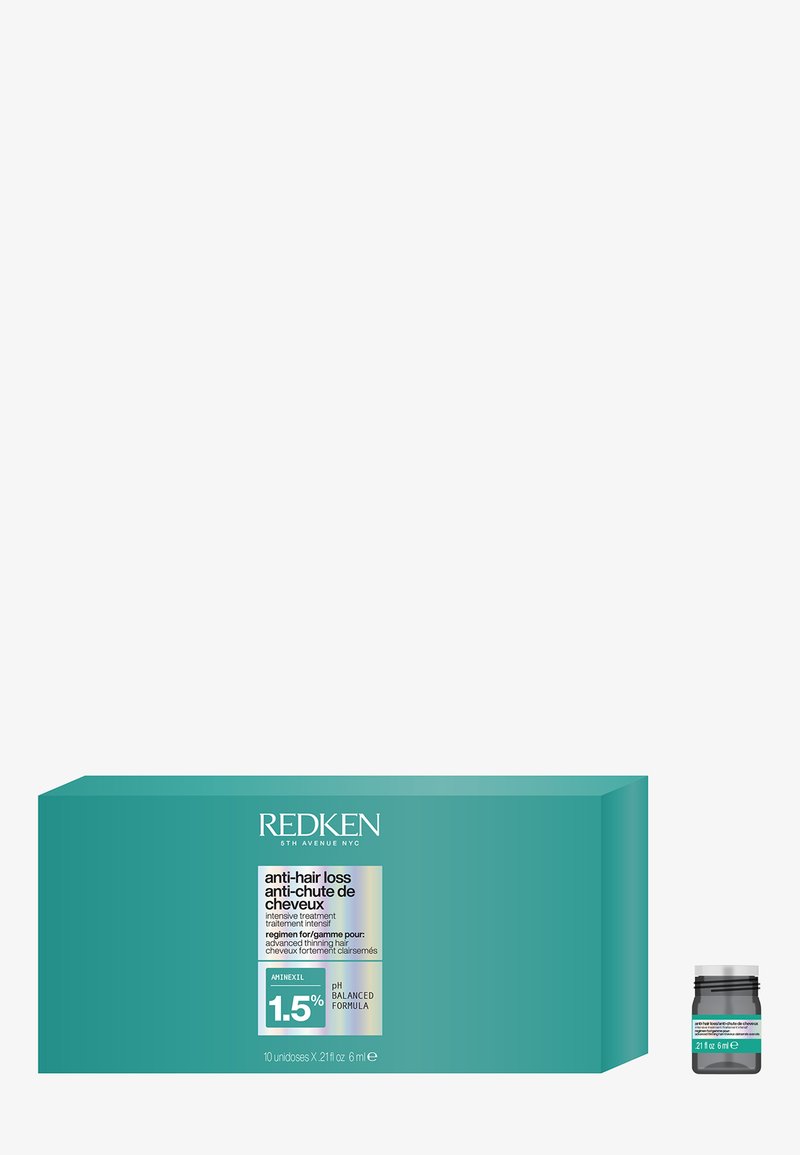 Traitement intensif anti-chute Redken avec 1,5 % d'Aminexil, formule au pH équilibré, dans une boîte turquoise avec un petit flacon pour cheveux clairsemés avancés.