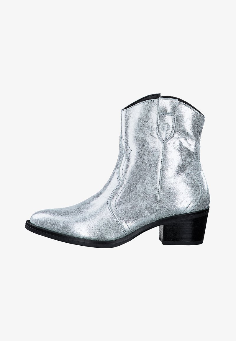 Bottes mi-cheville argentées avec une finition métallique brillante, bout pointu, style western subtil et petit talon bloc. Tige texturée avec détails de couture.