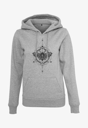 Grå huvtröja med en framficka, prydd med en svart geometrisk och blommig design i mitten. Mjuk tygkvalitet och ribbade muddar.
