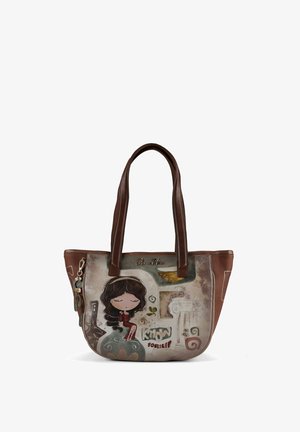 Brown leather tote bag with graphic print featuring a girl and "Know Yourself." Designed with dual handles and textured surface details.