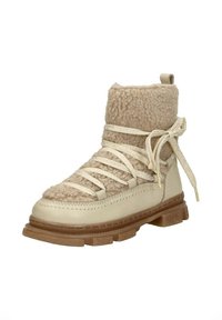 Beige veterschoen met een luxe bovenkant en een glad leren onderkant. Voorzien van een dikke zool en een zachte, gestructureerde kraag. Aangevuld met geweven veters.