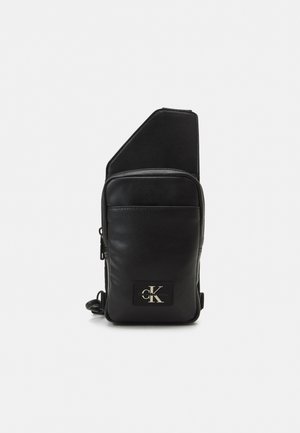 Calvin Klein Jeans, Étui à portable - black