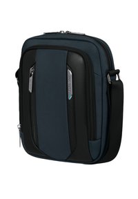 Borsa a tracolla compatta blu navy e nera con più scomparti con zip e una tracolla regolabile.