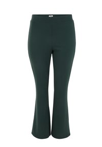 Donkergroene uitlopende broek gemaakt van stretchstof. Heeft een brede, elastische tailleband en een gladde textuur zonder zichtbare naden of zakken.