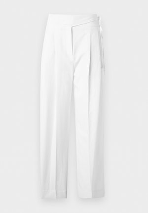 White high-waist wide-leg trousers with side tie detail and front pleats, displayed against a plain background.