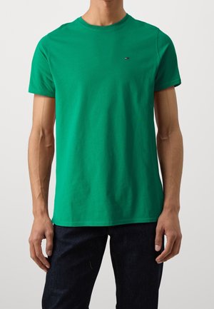 Grünes Baumwoll-T-Shirt mit Rundhalsausschnitt und kurzen Ärmeln, das ein kleines Logo auf der Brust und eine lockere Passform bietet.