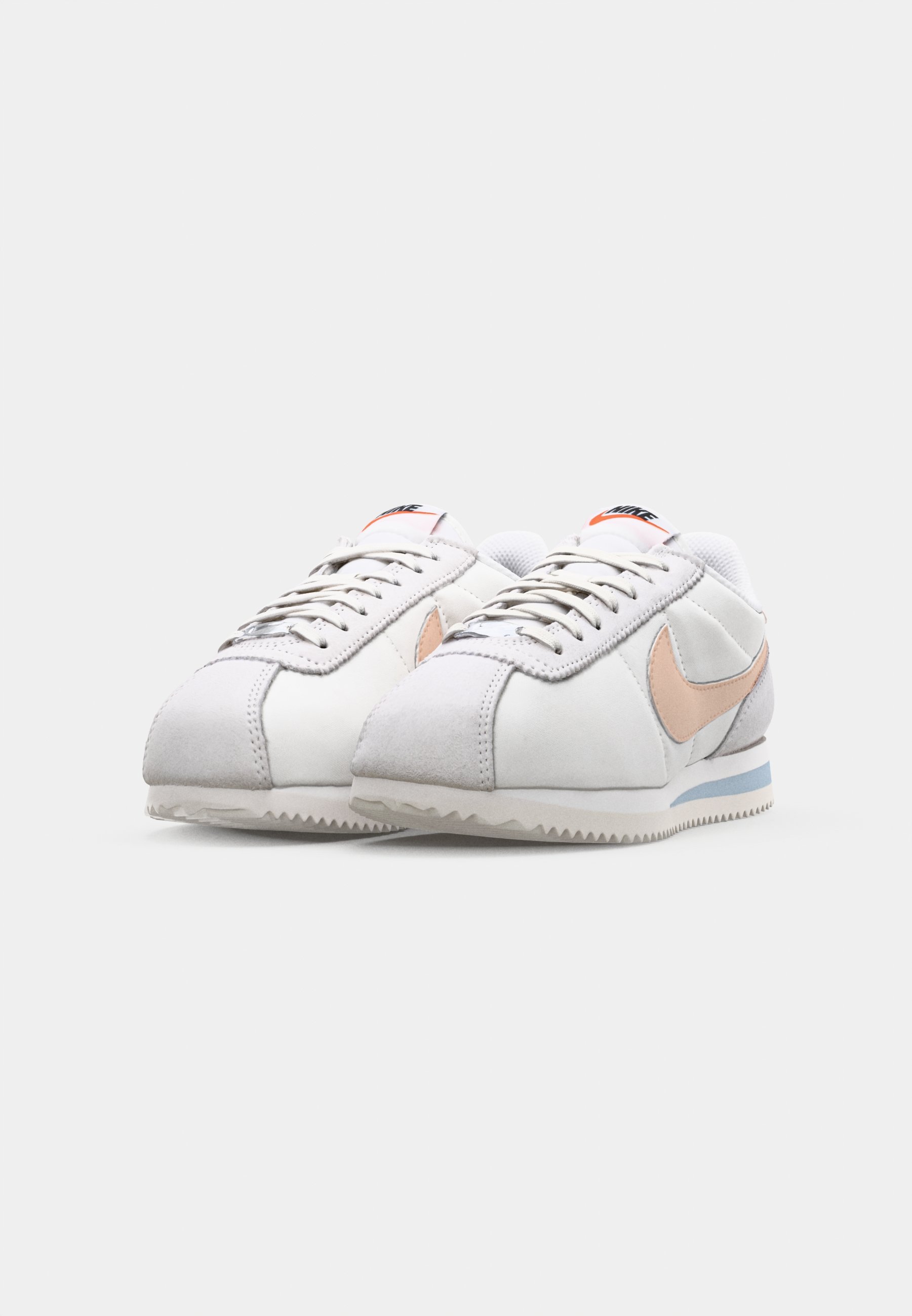 nike cortez light bone particle pink