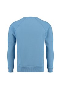 Sudadera azul claro con puños y dobladillo acanalados, que presenta una textura suave y mangas raglán. Sin logotipos ni patrones visibles.