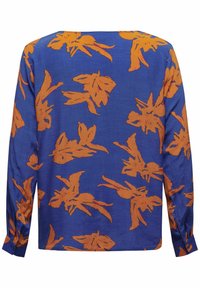 Langärmliges Oberteil aus blauem Stoff mit orangem Blumenmuster. Hat einen lockeren Schnitt und knöpfbare Manschetten. Glatte Textur mit entspanntem Design.