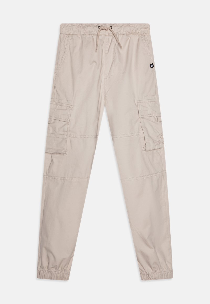 Beige cargo nadrág, rugalmas derékkal és állítható zsinórral, oldalzsebekkel és díszített varrásokkal.