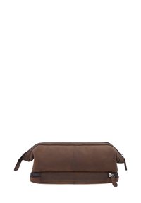 Rudas odinis kosmetikos krepšys su lygiu paviršiumi, užtrauktuku ir kontrastingomis siūlėmis. Turi apvalią formą su plokščiu dugnu, užtikrinančiu stabilumą.