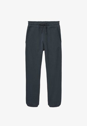 Tummanharmaat verkkarit, jotka on valmistettu pehmeästä kankaasta. Varustettu joustavalla vyötärönauhalla, joissa on nyöri, sivutaskuilla ja ribbireunoilla. Hillitty logoyksityiskohta.