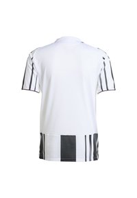 Chemise blanche à manches courtes avec des rayures verticales noires sur les manches et le bas. Fabriquée en tissu texturé avec un col rond.