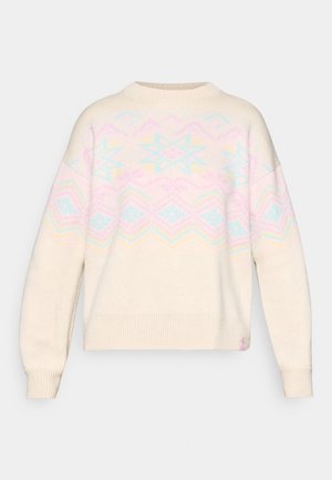 Light cream sweater with pastel geometric patterns in pink, blue, and yellow. Features a round neck and ribbed cuffs and hem. Loose fit.