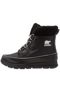 Black waterproof winter boot with a textured faux fur collar, lace-up design, and Sorel logo on the side. Features a thick, durable sole.