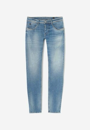 Lichtblauwe denim jeans met een slim fit, voorzien van vijf zakken, subtiele vervaging en een ritssluiting. Het materiaal is zacht en enigszins gestructureerd.