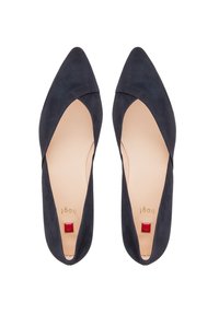 Pointed-toe navy suede flats with a cutout design. Lined in beige leather, featuring a red square accent on the heel. Elegant and minimalistic.