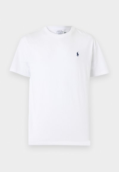 Λευκό κοντομάνικο T-shirt με στρογγυλή λαιμόκοψη και μικρό σκούρο μπλε λογότυπο παίκτη πόλο στο αριστερό στήθος.