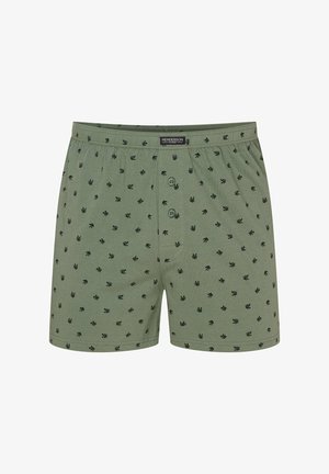 Zielone bawełniane bokserki o miękkiej fakturze, z czarnymi wzorami liści i zapięciem na guziki z przodu. Elastyczny pasek dla wygody.