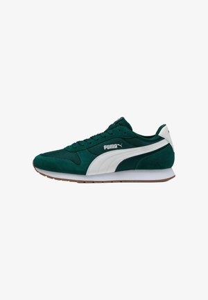 Roheline sametist sneakers valgete aktsentlintidega, võrgusilmast keeleosa, kummist tallaga ja paeltega. Küljel on silmapaistev Puma logo.