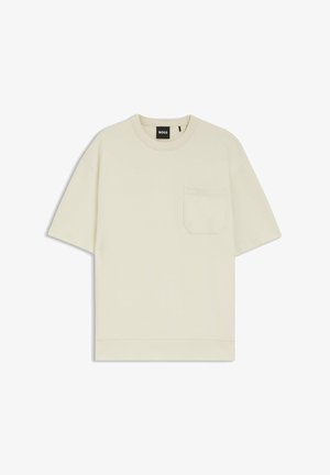Beige short-sleeve T-shirt with crew neck and chest pocket, labeled "BOSS" on black tag inside neckline.