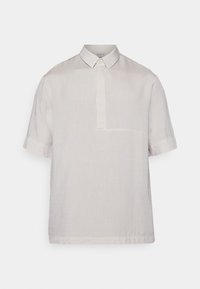 - Koszulka polo