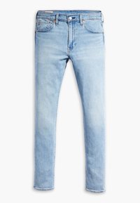 Jean denim slim bleu clair avec cinq poches, fermeture par bouton et coutures visibles sur fond blanc.