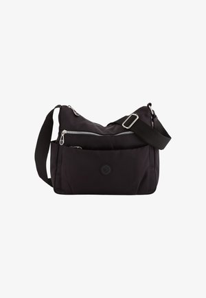 Bolsa de hombro negra de nylon con correa ajustable, que cuenta con bolsillos con cremallera y un botón de acento texturizado en la parte frontal.