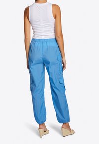 Rich & Royal Kapsáče - blue