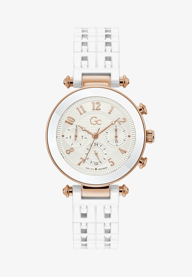 Biały silikonowy zegarek z teksturowaną kremową tarczą, różowozłotymi akcentami, dużymi cyframi i trzema subtarczami. Posiada wzorzystą bransoletę.