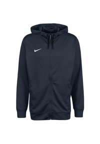 Sweat à capuche zippé Nike bleu marine avec un tissu texturé, une capuche à cordon ajustable et un logo blanc sur la poitrine gauche. Comprend des poignets et un ourlet côtelés.