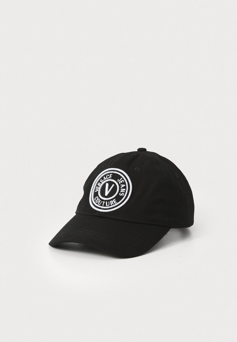 Black cotton baseball cap with a circular white embroidered logo reading "Versace Jeans Couture" and a button on top.